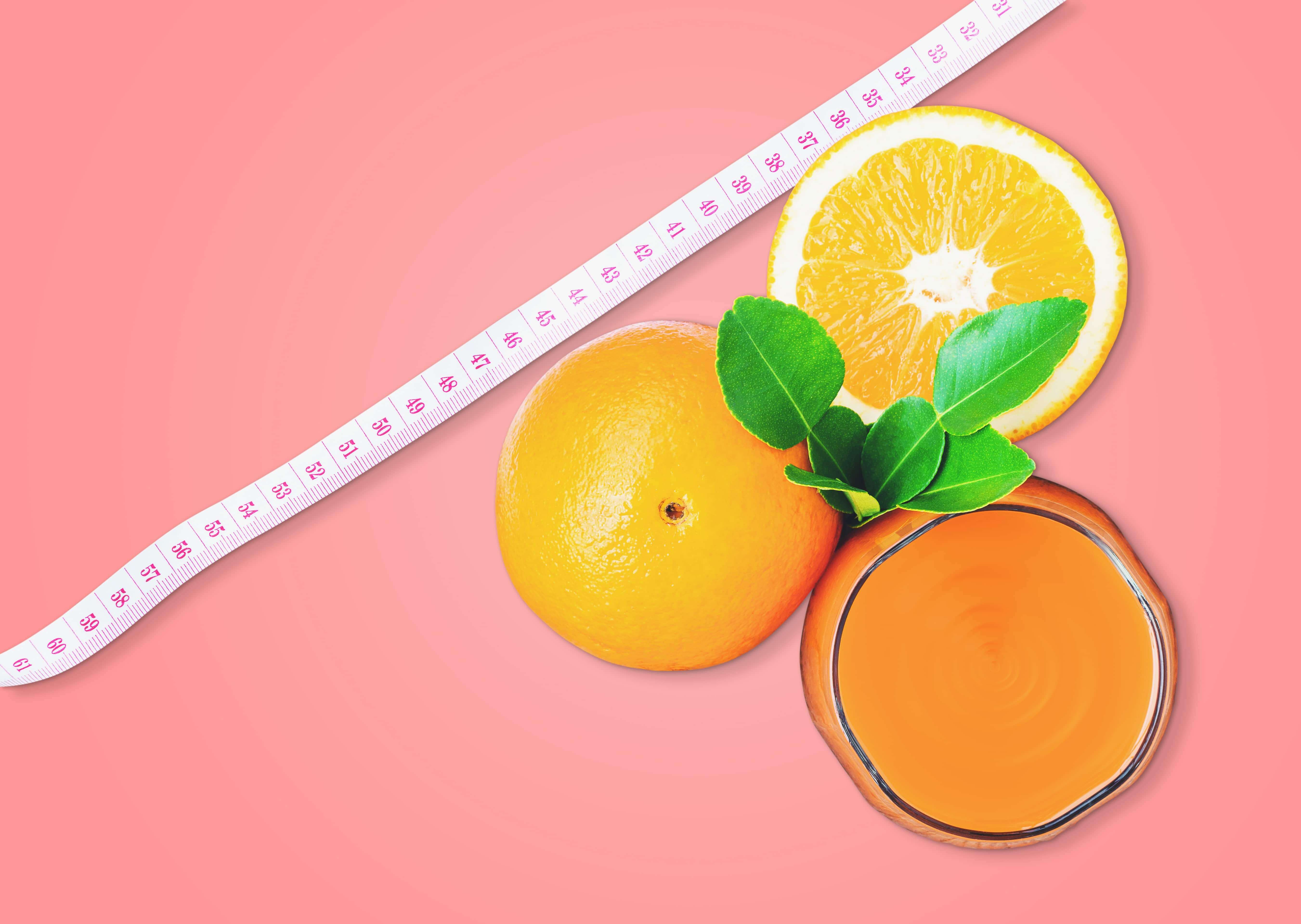 vecteezy_top_view_of_orange_juice_and_oranges_with_measuring_tape (1)